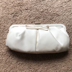 White clutch with bow detail